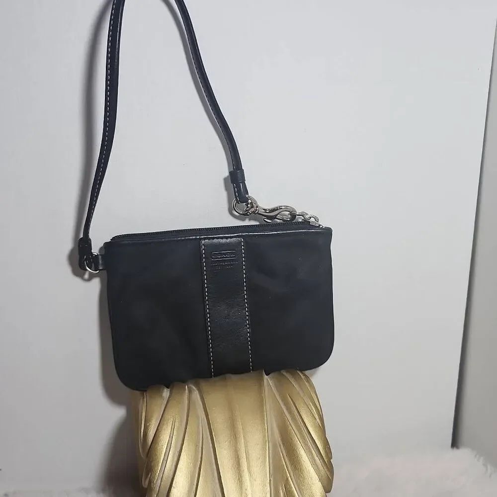 Vintage Coach black nylon and leather wristlet.